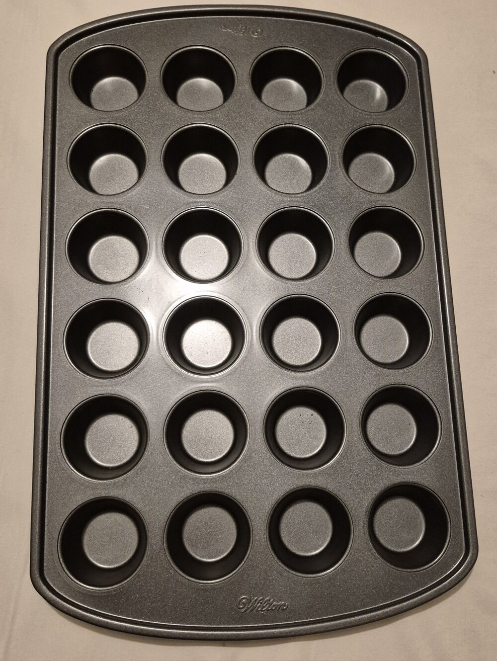 Wilton 24-Cup Nonstick Mini Muffin Pan - Black